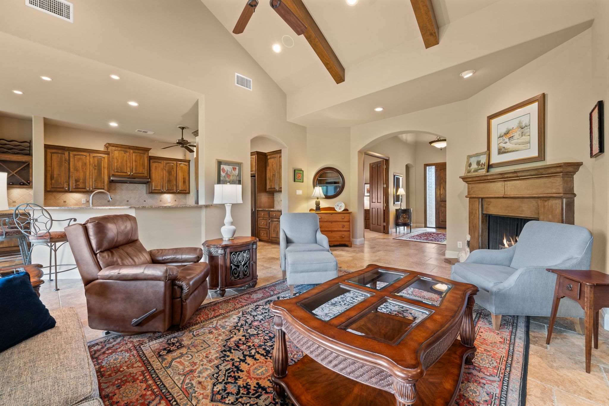 14 Borello Drive, Unit 14 Austin, TX 78738 - Photo 10 of 33 a living room with furniture and a fireplace