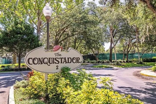 a building with trees in front of it