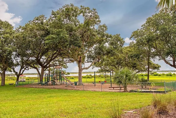 a view of balcony with wooden floor