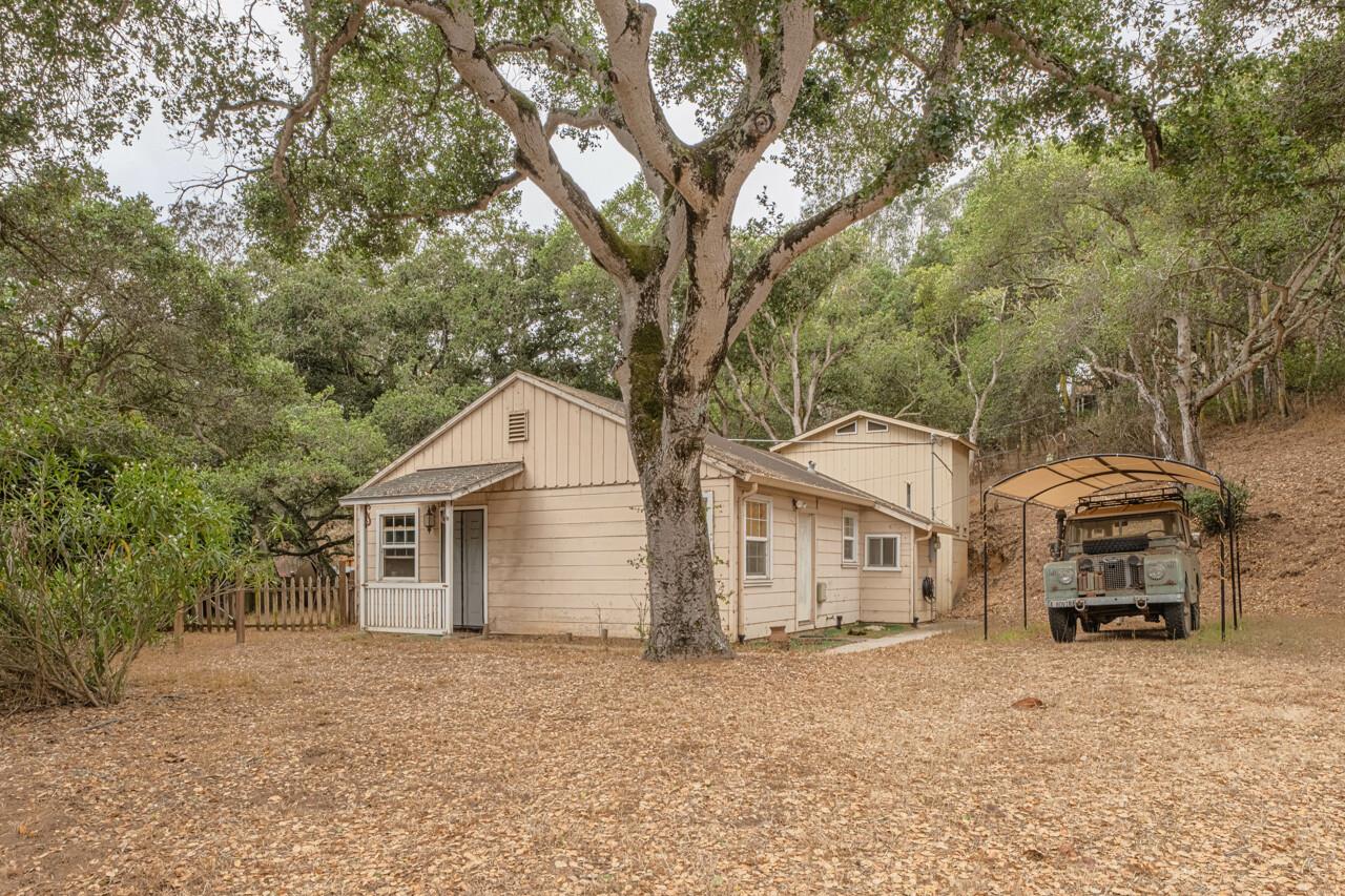 17229 McGuffie Road Prunedale, CA 93907 - Photo 7 of 9 a front view of a house with a yard and garage