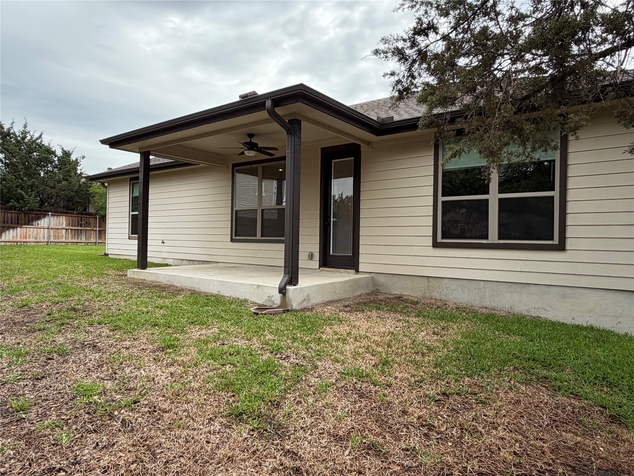 206 Fairway Circle Point Venture, TX 78645 - Photo 16 of 24 a house that has a lot of windows in it