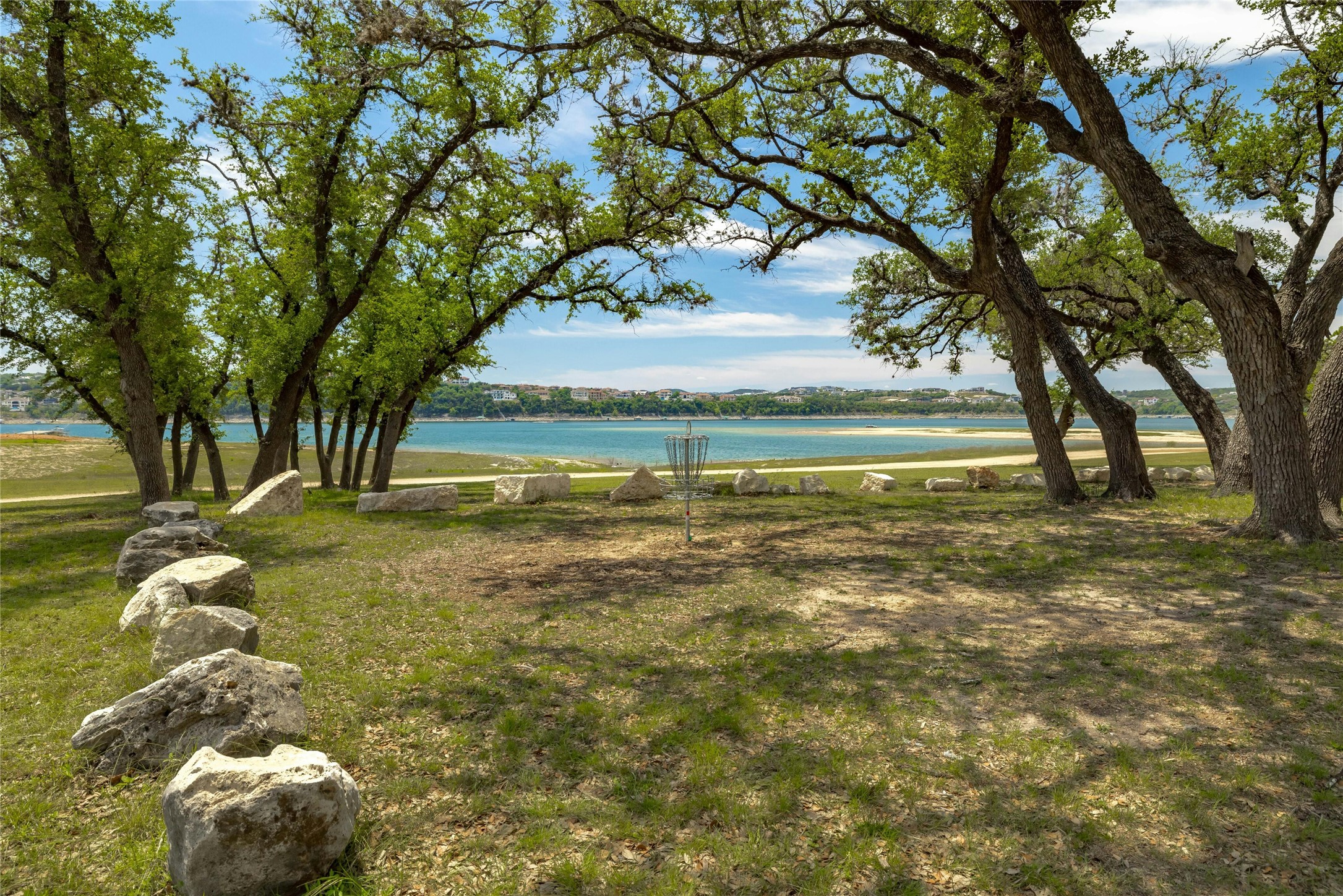 206 Fairway Circle Point Venture, TX 78645 - Photo 23 of 24 a view of an ocean with trees