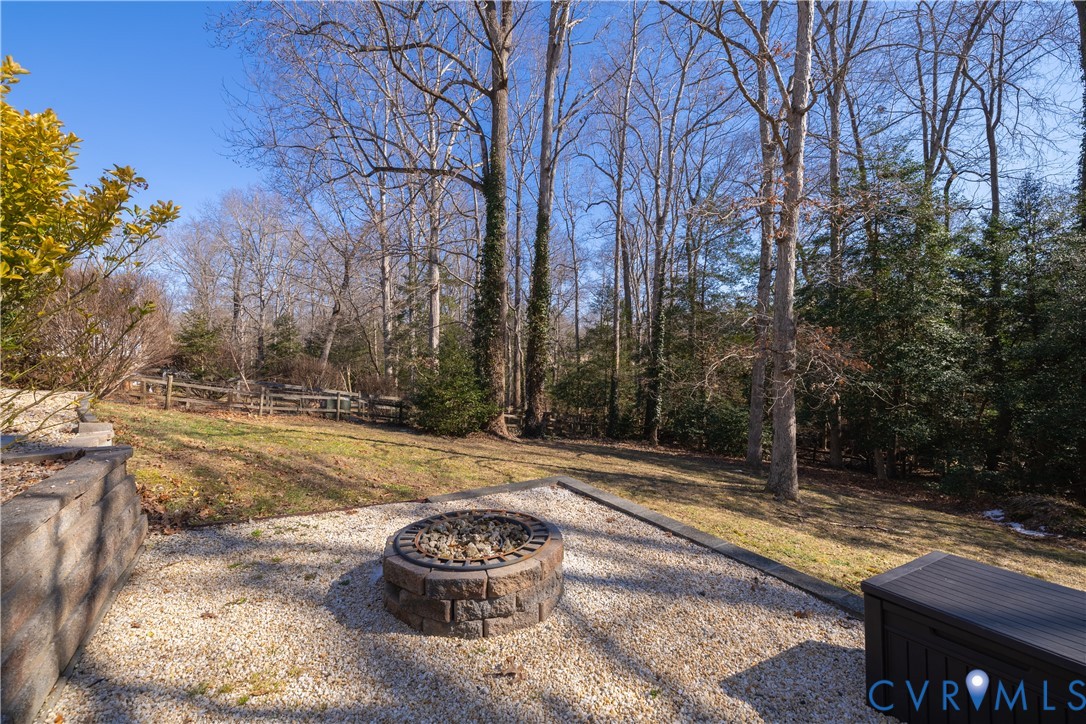 5307 Krag Road Chester, VA 23831 - Photo 12 of 49 a view of a yard with large trees