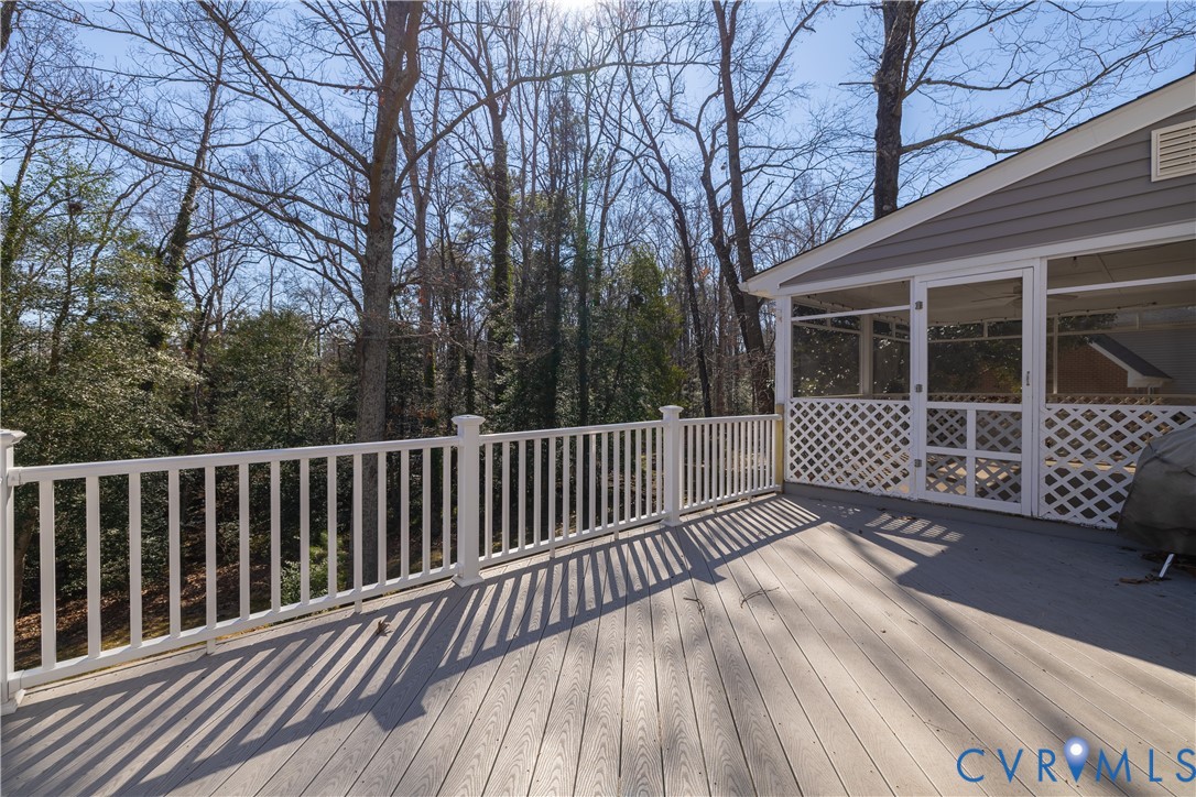 5307 Krag Road Chester, VA 23831 - Photo 14 of 49 a view of a deck with a large window and wooden fence