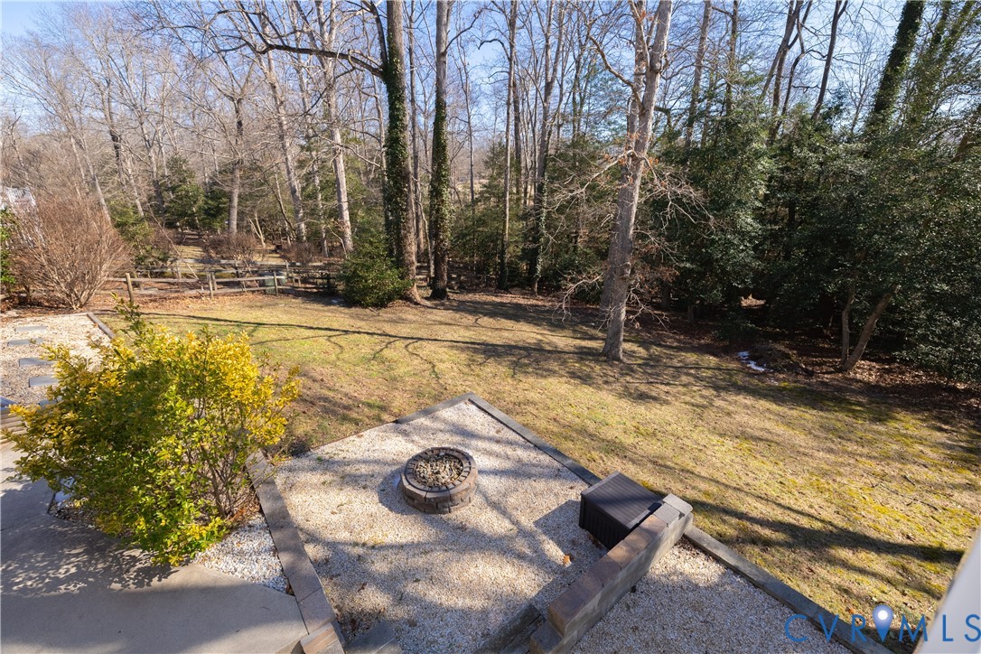 5307 Krag Road Chester, VA 23831 - Photo 16 of 49 a view of a backyard with chairs