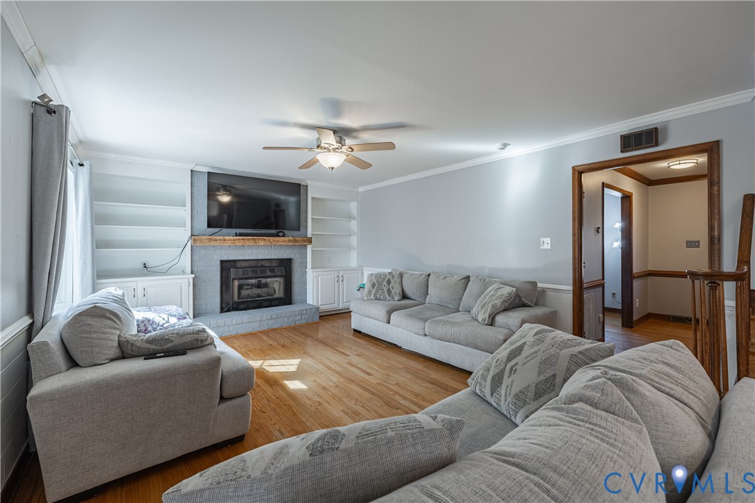 5307 Krag Road Chester, VA 23831 - Photo 17 of 49 a living room with furniture a fireplace