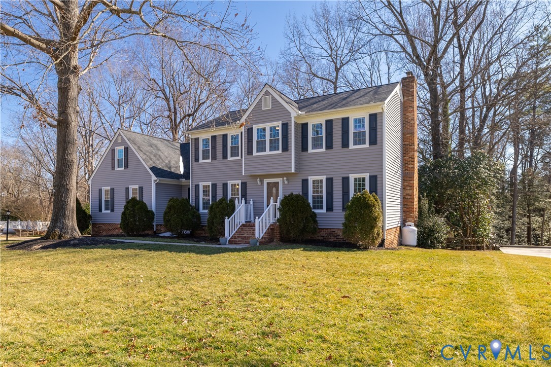 5307 Krag Road Chester, VA 23831 - Photo 2 of 49 a view of house with yard in front of it