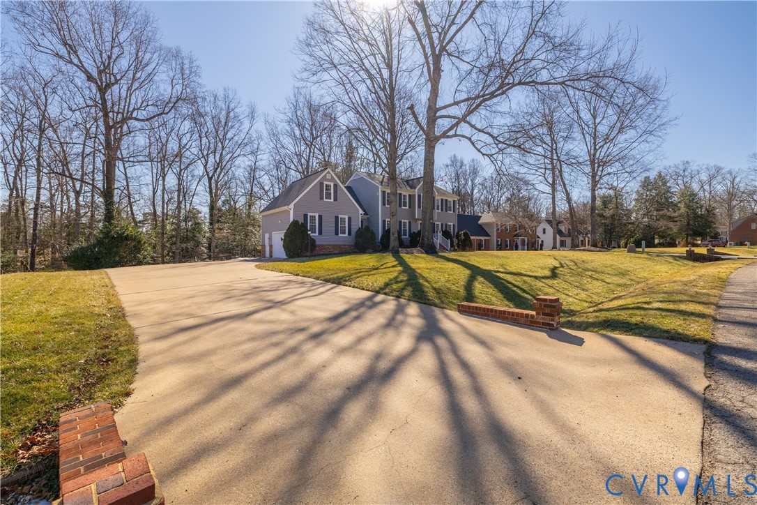 5307 Krag Road Chester, VA 23831 - Photo 3 of 49 a view of a house with snow on the road