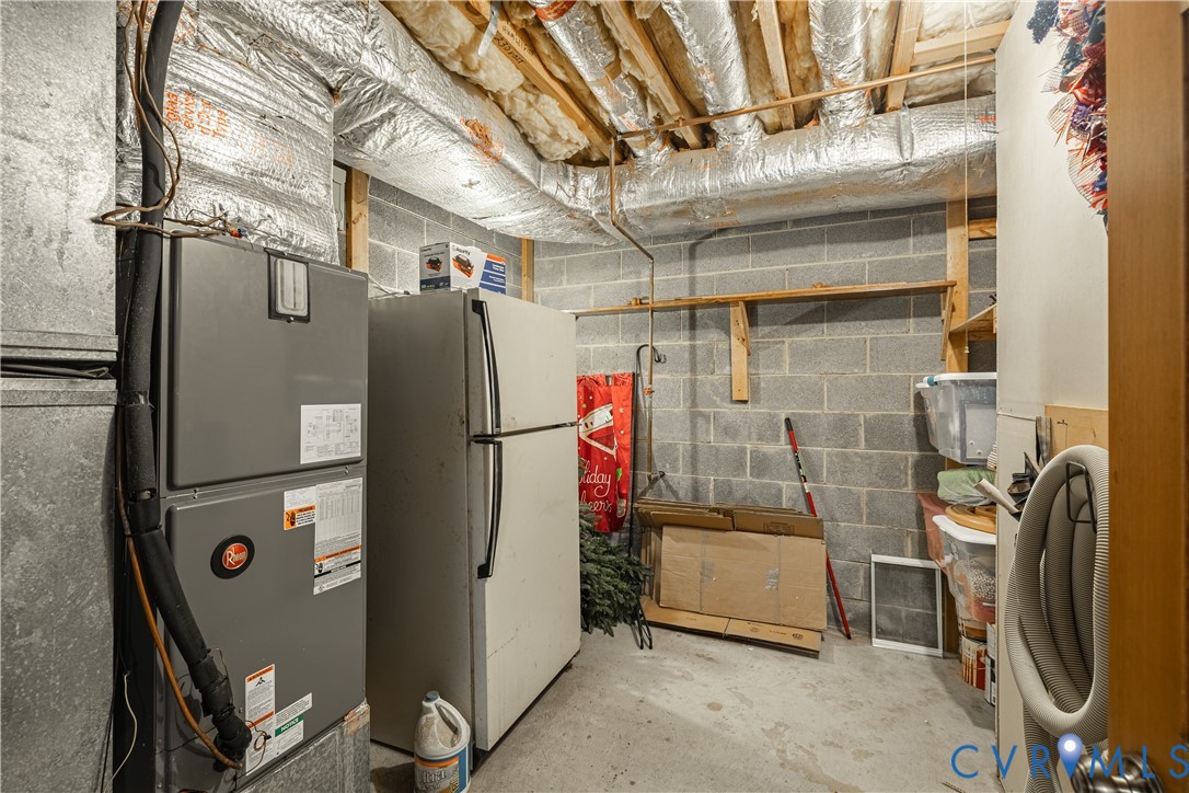 5307 Krag Road Chester, VA 23831 - Photo 32 of 49 a view of storage and utility room with a garage
