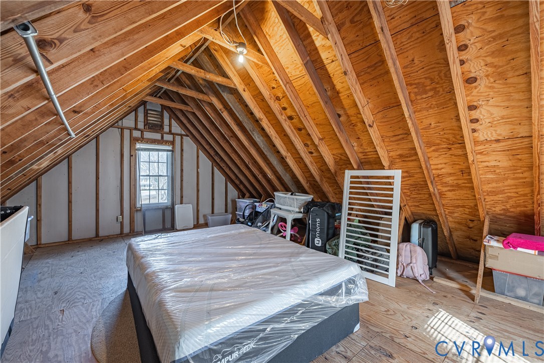 5307 Krag Road Chester, VA 23831 - Photo 35 of 49 a bed sitting in a spacious bedroom next to a window