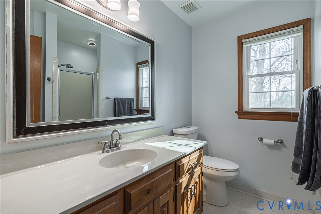 5307 Krag Road Chester, VA 23831 - Photo 40 of 49 a bathroom with a sink and a toilet