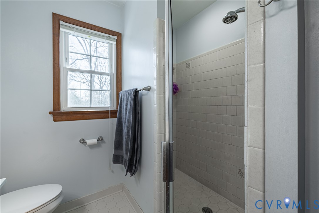 5307 Krag Road Chester, VA 23831 - Photo 41 of 49 a bathroom with a toilet and a shower
