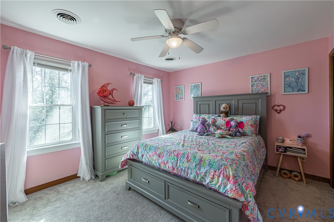 5307 Krag Road Chester, VA 23831 - Photo 43 of 49 a bedroom with a bed and a dresser