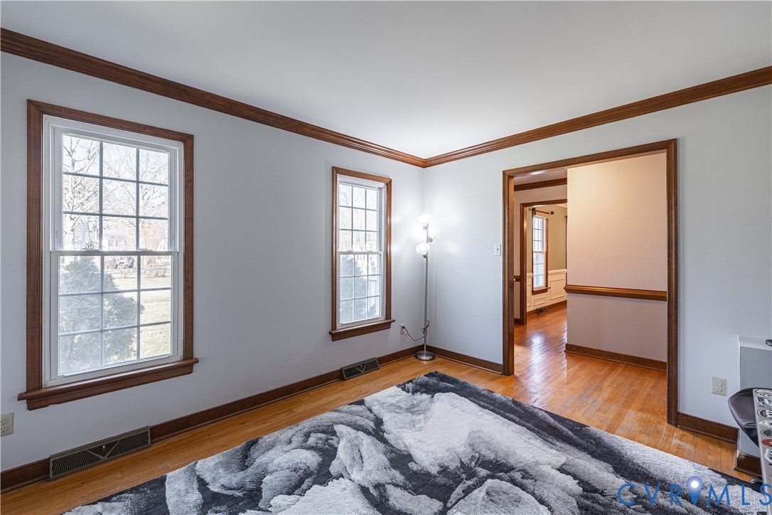 5307 Krag Road Chester, VA 23831 - Photo 47 of 49 a view of livingroom with hardwood floor and window