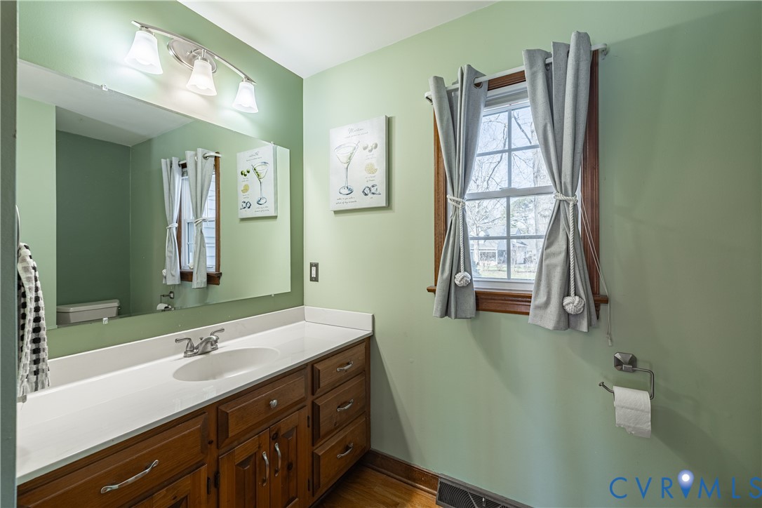 5307 Krag Road Chester, VA 23831 - Photo 49 of 49 a bathroom with a sink and a mirror