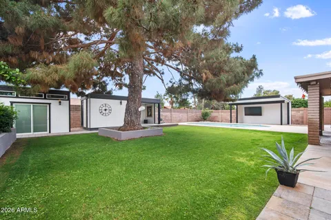 a view of a house with swimming pool