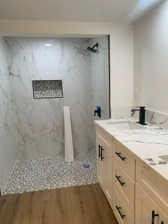 a bathroom with a sink and a mirror