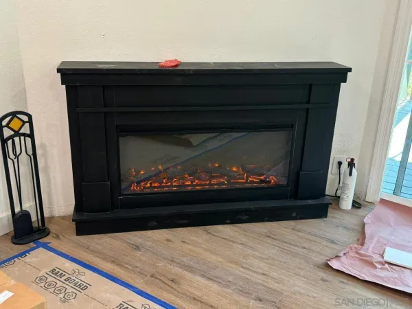 a living room with a fireplace