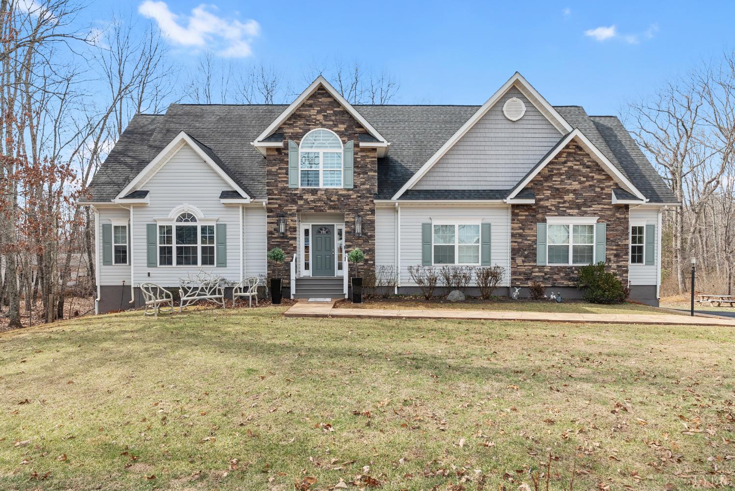 2067 Flint Hill Road Moneta, VA 24121 - Photo 3 of 70 a front view of a house with a yard