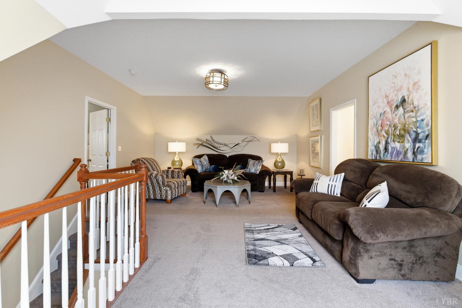 2067 Flint Hill Road Moneta, VA 24121 - Photo 50 of 70 a living room with furniture and a large window