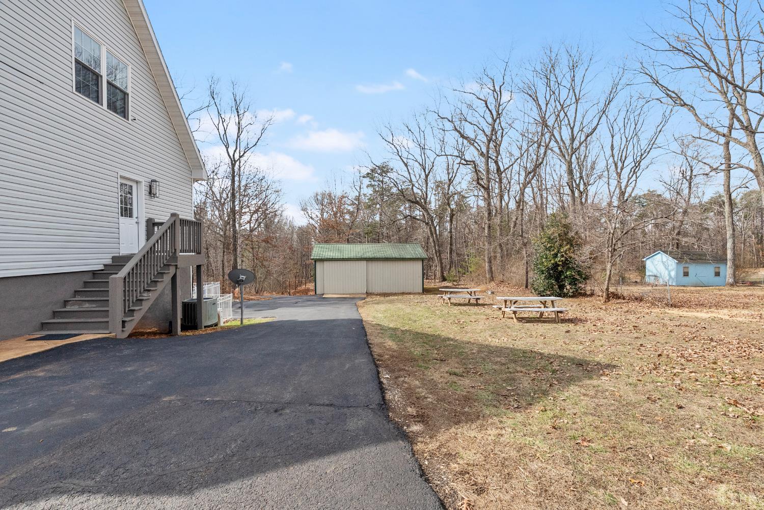 2067 Flint Hill Road Moneta, VA 24121 - Photo 58 of 70 a view of a house with snow on the road