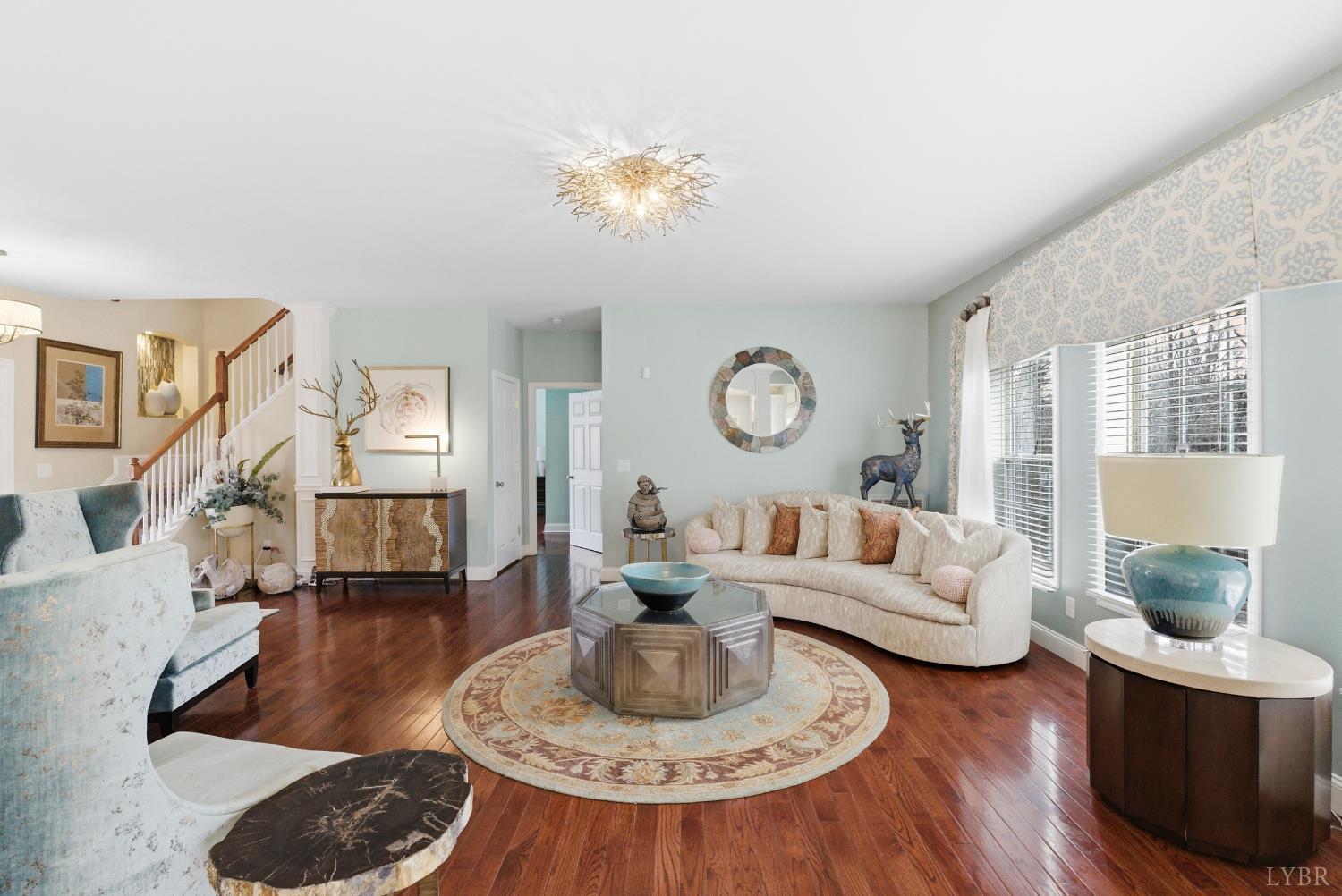 2067 Flint Hill Road Moneta, VA 24121 - Photo 10 of 70 a living room with furniture and a wooden floor