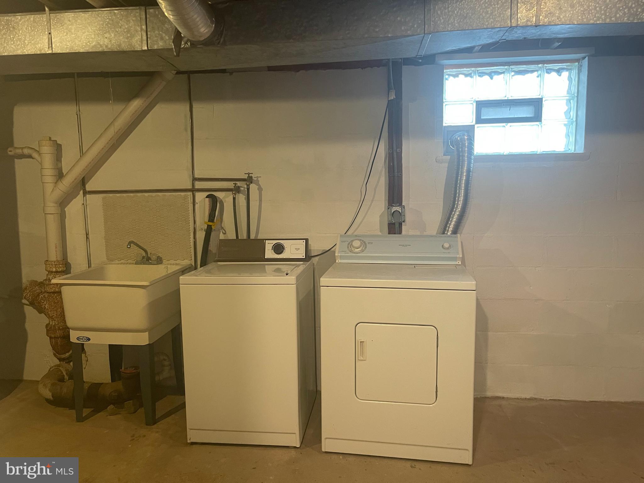 7931 Rolling View Avenue Baltimore, MD 21236 - Photo 13 of 14 Laundry Area