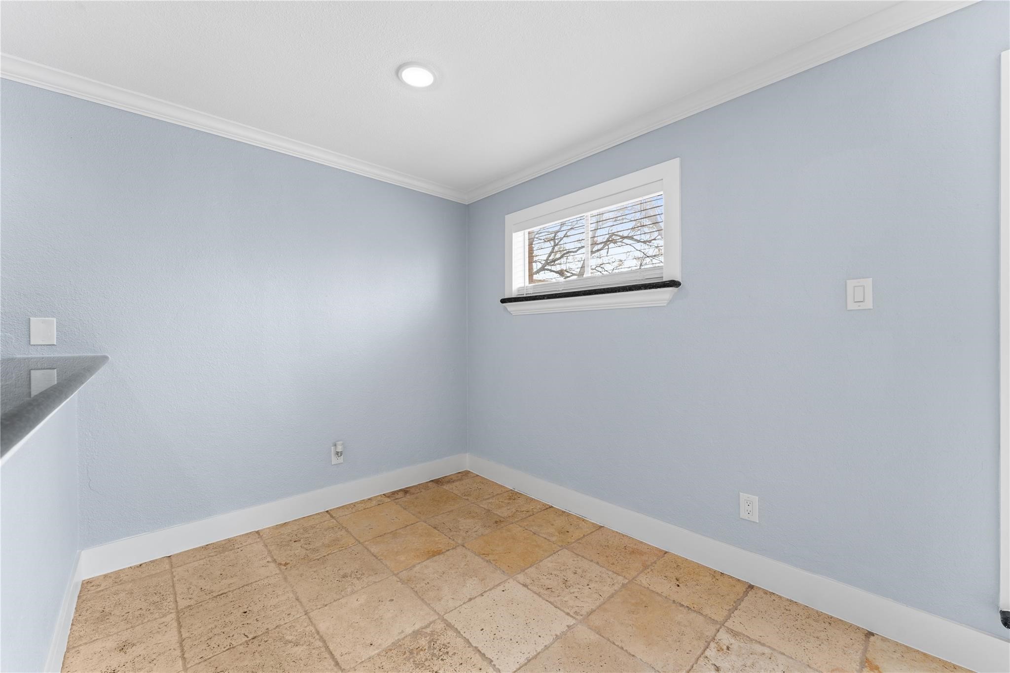 8118 Albacore Drive, Unit 7 Houston, TX 77074 - Photo 8 of 18 an empty room with a workbench