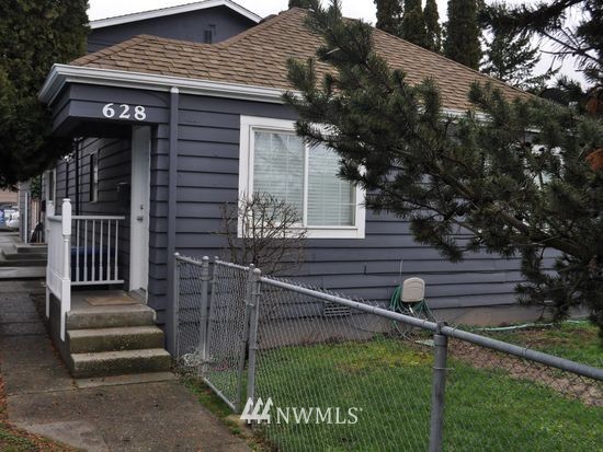 628 Shattuck Avenue South Renton, WA 98057 - Photo 1 of 1 a view of a house with a small yard