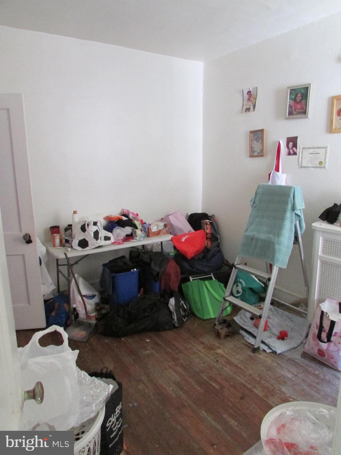 524 West Tabor Road Philadelphia, PA 19120 - Photo 11 of 14 a room with furniture and a wooden floor