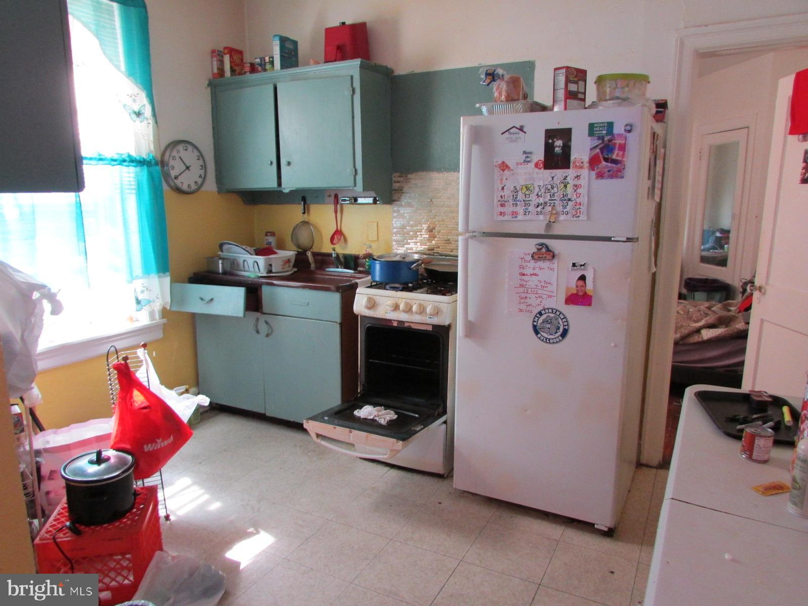 524 West Tabor Road Philadelphia, PA 19120 - Photo 14 of 14 a room with storage and utility