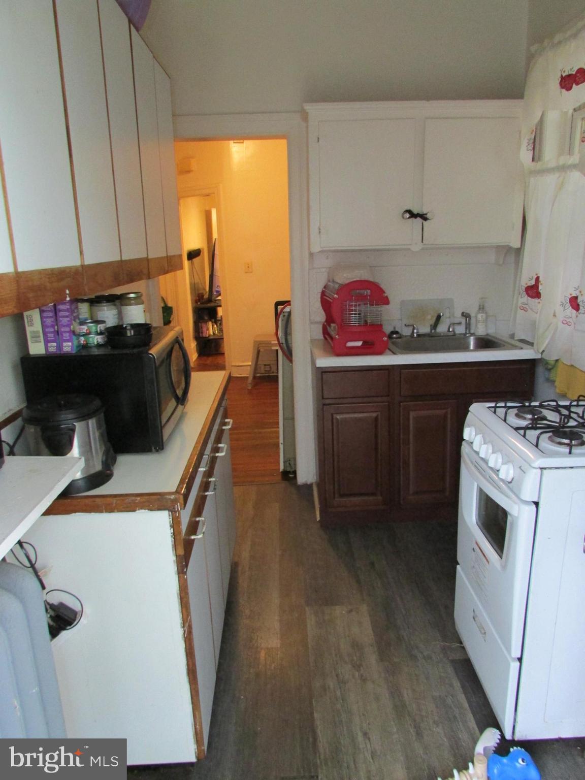 524 West Tabor Road Philadelphia, PA 19120 - Photo 5 of 14 a utility room with sink dryer and washer