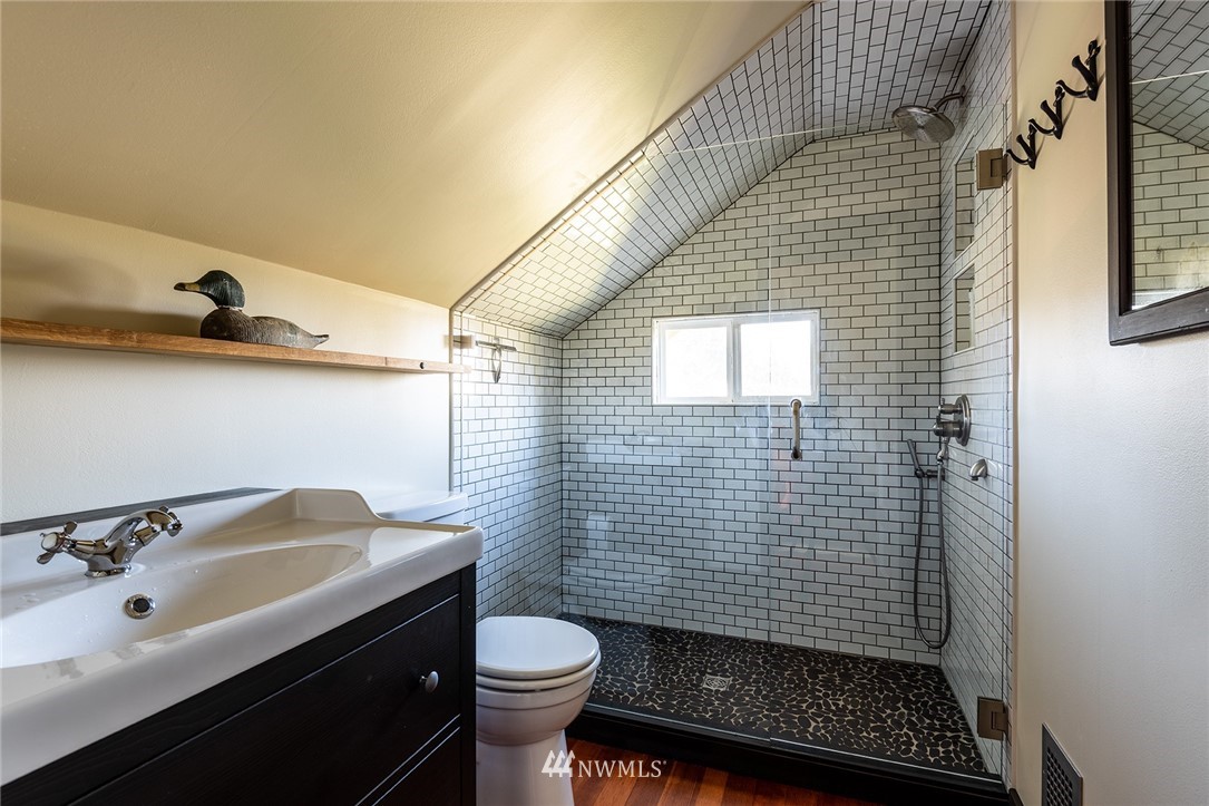 9048 Southwest Soper Road Vashon, WA 98070 - Photo 11 of 27 a bathroom with a sink toilet and shower