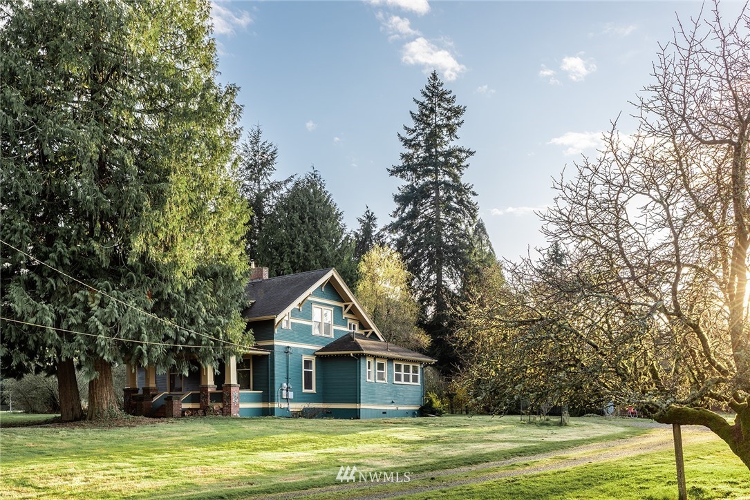 9048 Southwest Soper Road Vashon, WA 98070 - Photo 25 of 27 a view of a house with a swimming pool