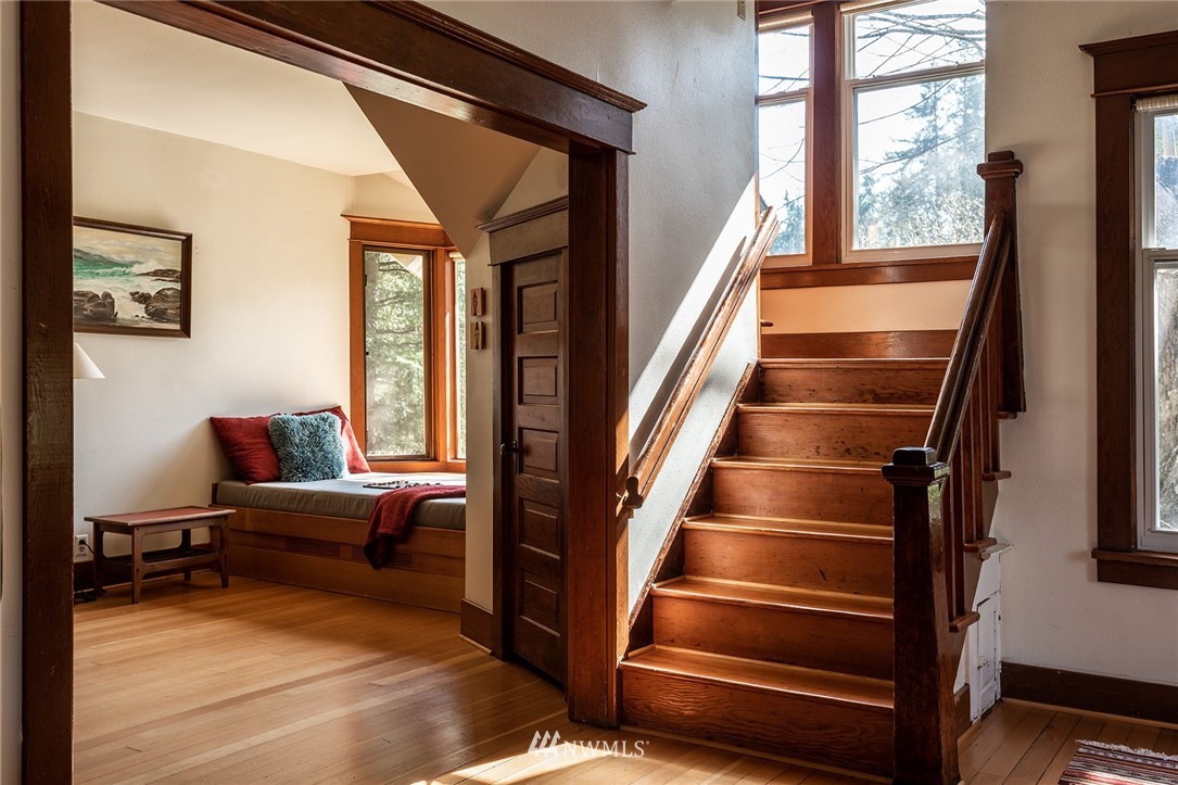 9048 Southwest Soper Road Vashon, WA 98070 - Photo 7 of 27 a living room with furniture and stairs