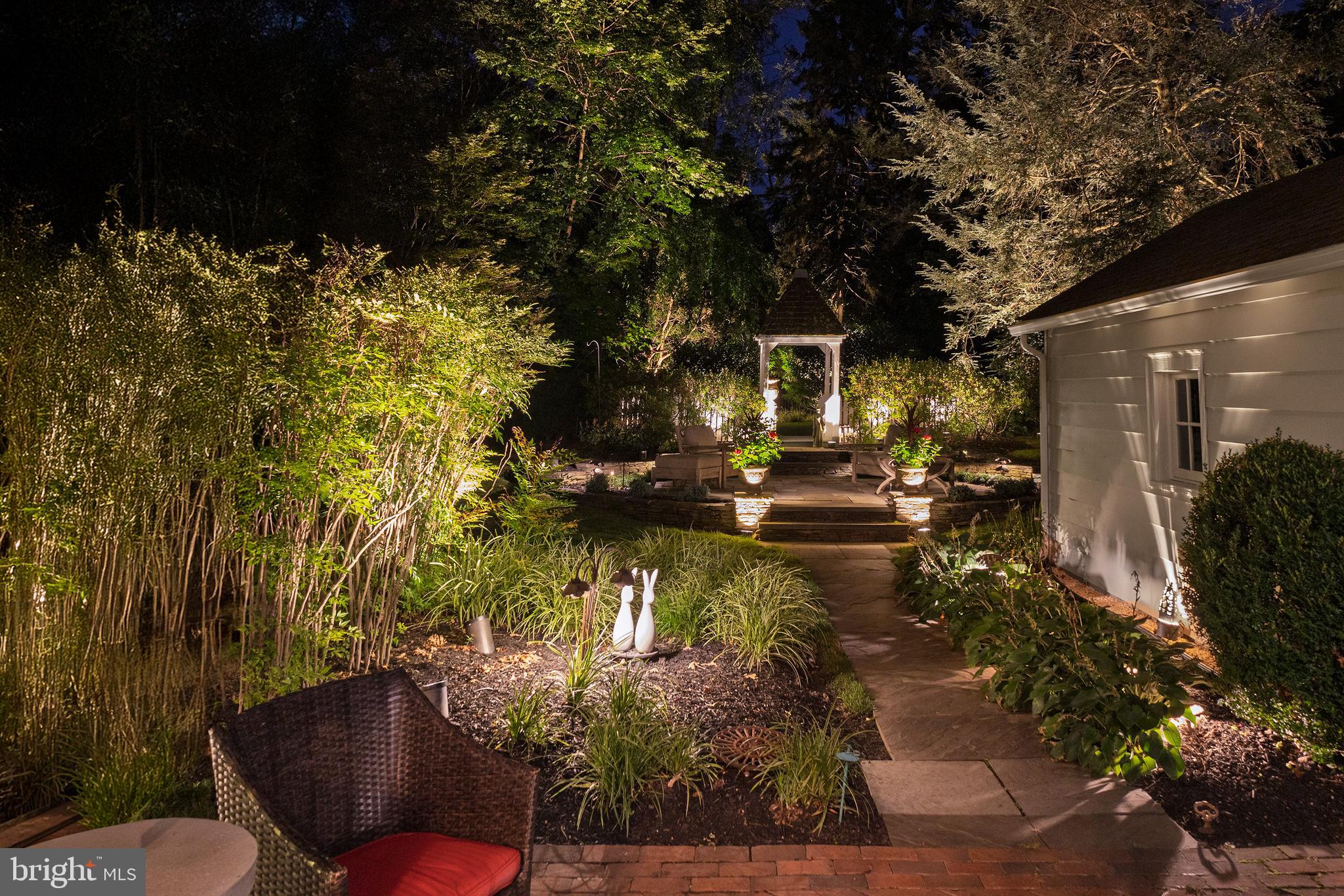 312 Woodland Avenue Haddonfield, NJ 08033 - Photo 14 of 44 a view of backyard with outdoor seating