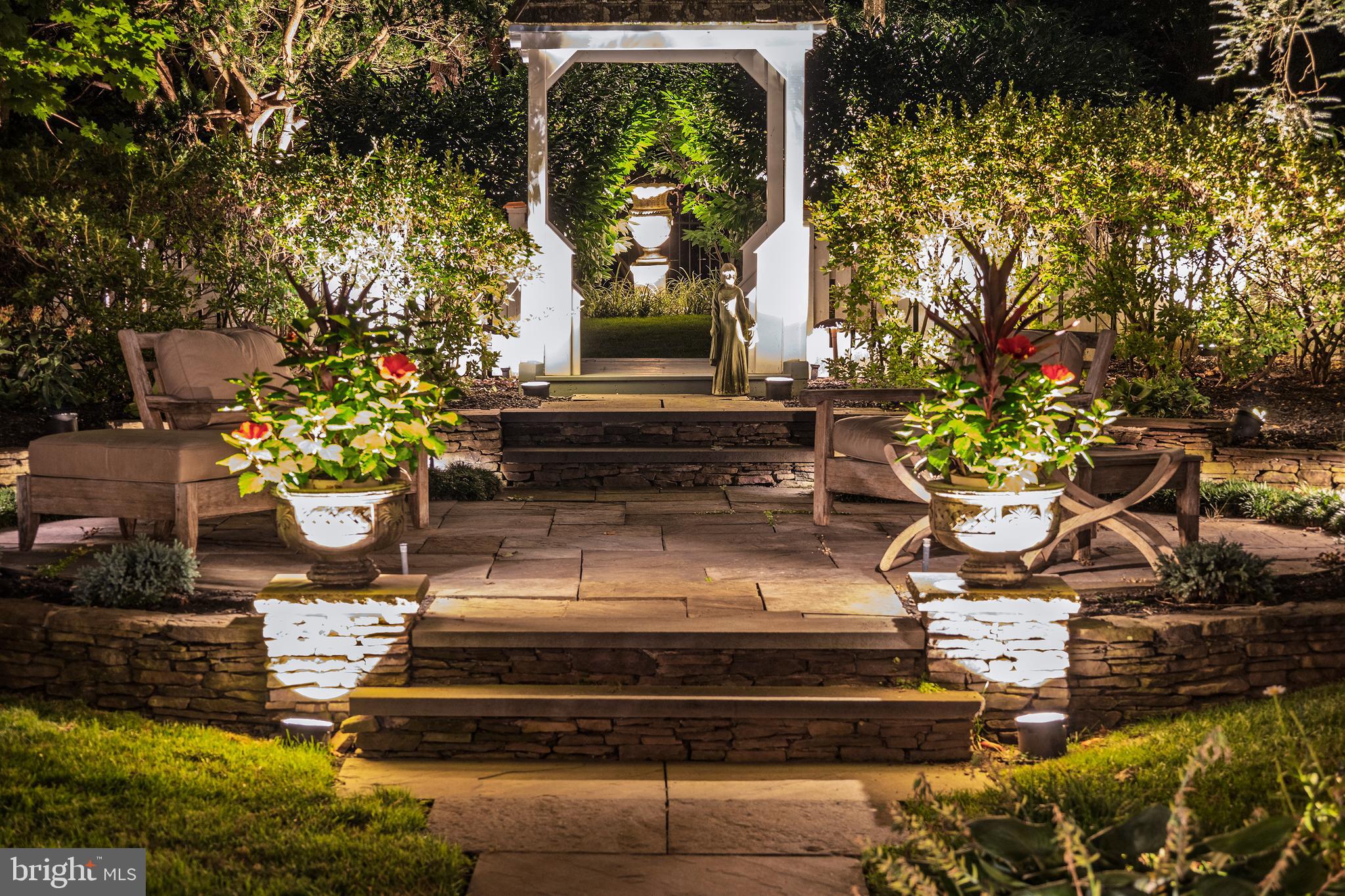 312 Woodland Avenue Haddonfield, NJ 08033 - Photo 15 of 44 a vase of flowers sitting on a table