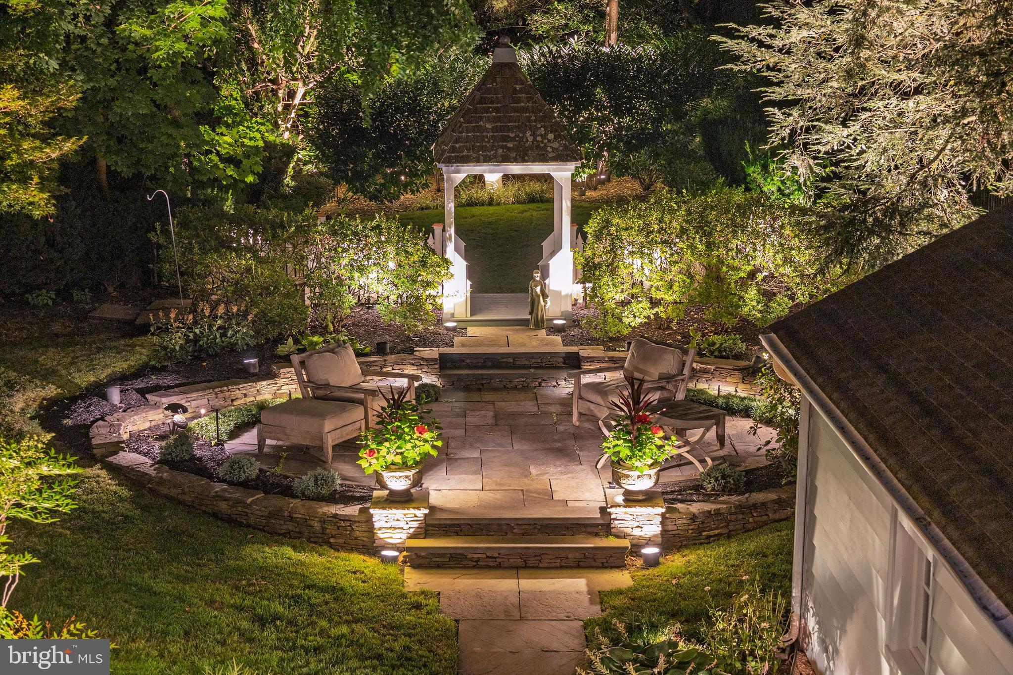 312 Woodland Avenue Haddonfield, NJ 08033 - Photo 17 of 44 a view of a house with pool and garden