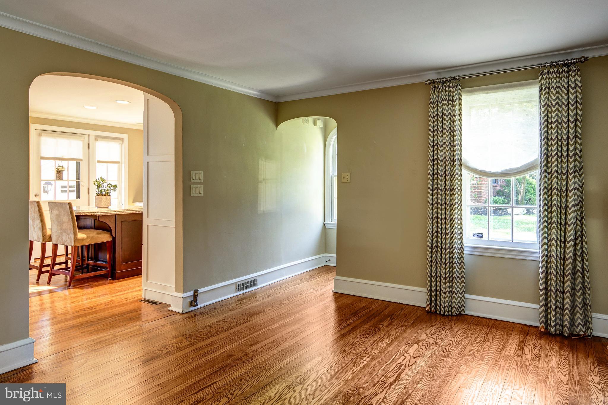 312 Woodland Avenue Haddonfield, NJ 08033 - Photo 18 of 44 an empty room with wooden floor and a window