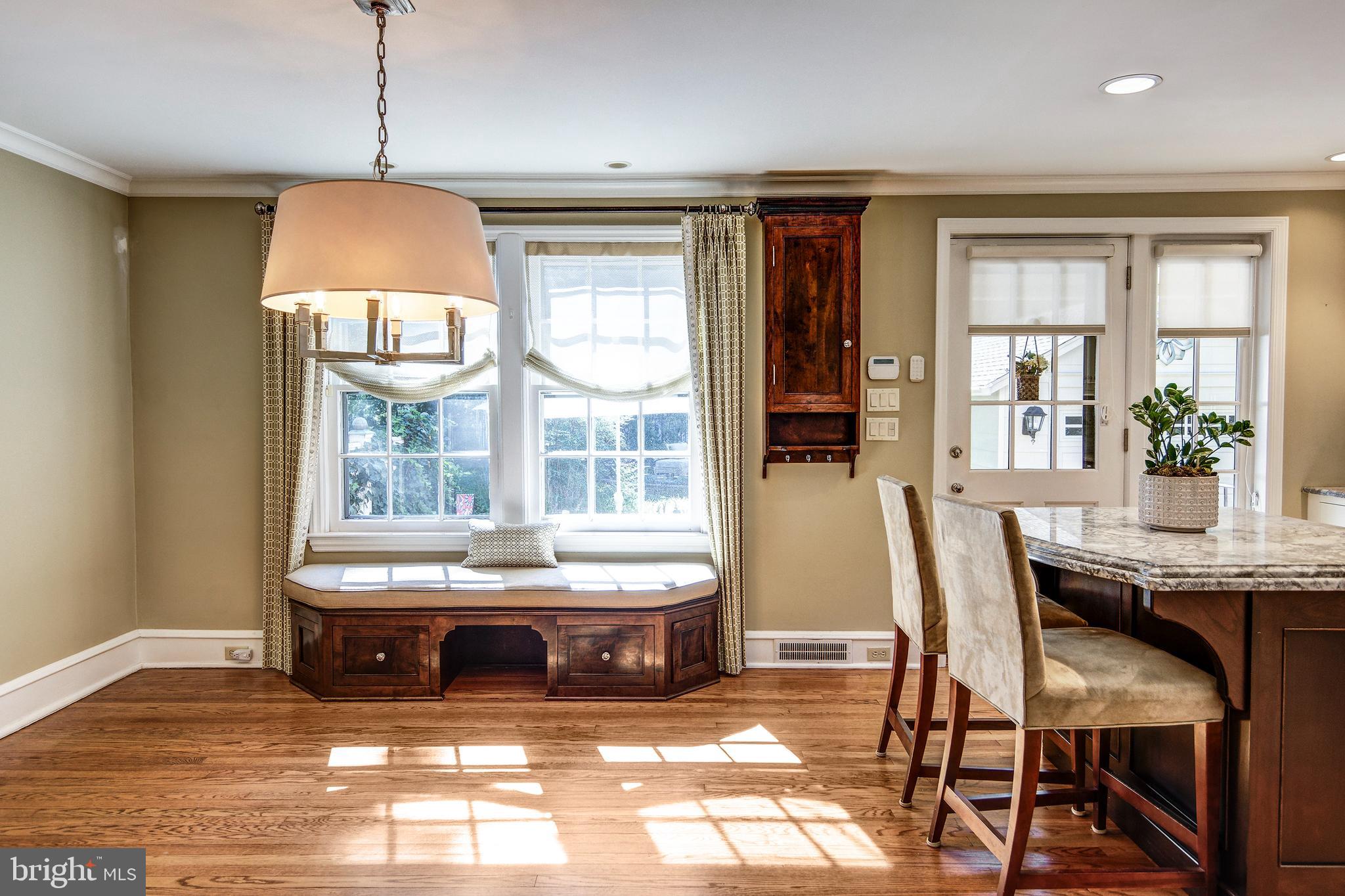 312 Woodland Avenue Haddonfield, NJ 08033 - Photo 25 of 44 a living room with a table and chairs