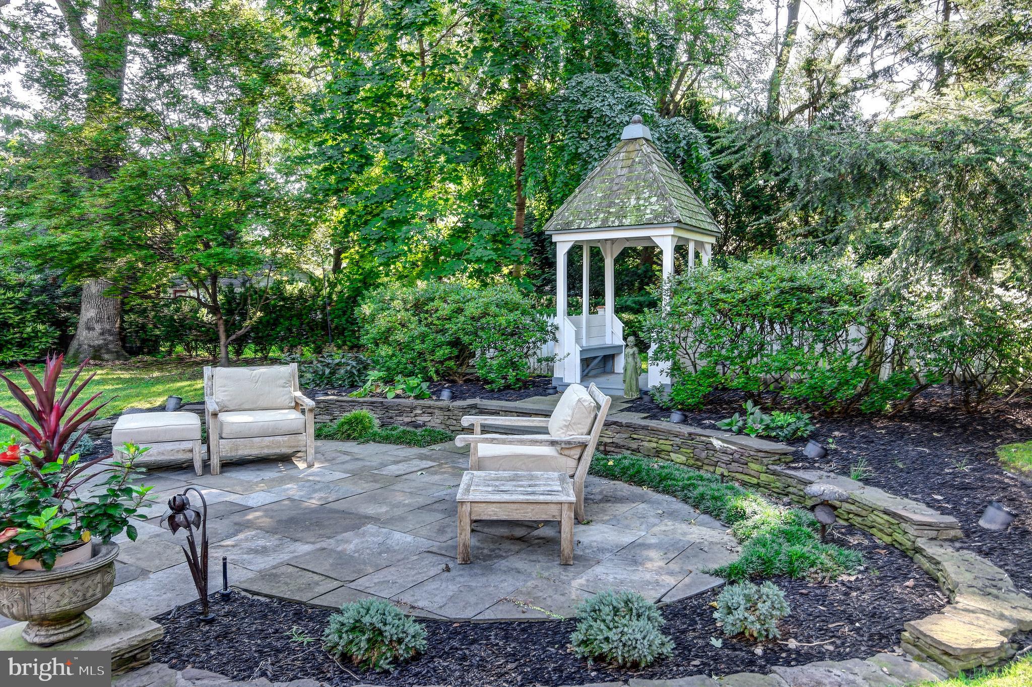 312 Woodland Avenue Haddonfield, NJ 08033 - Photo 7 of 44 a garden view with a seating space