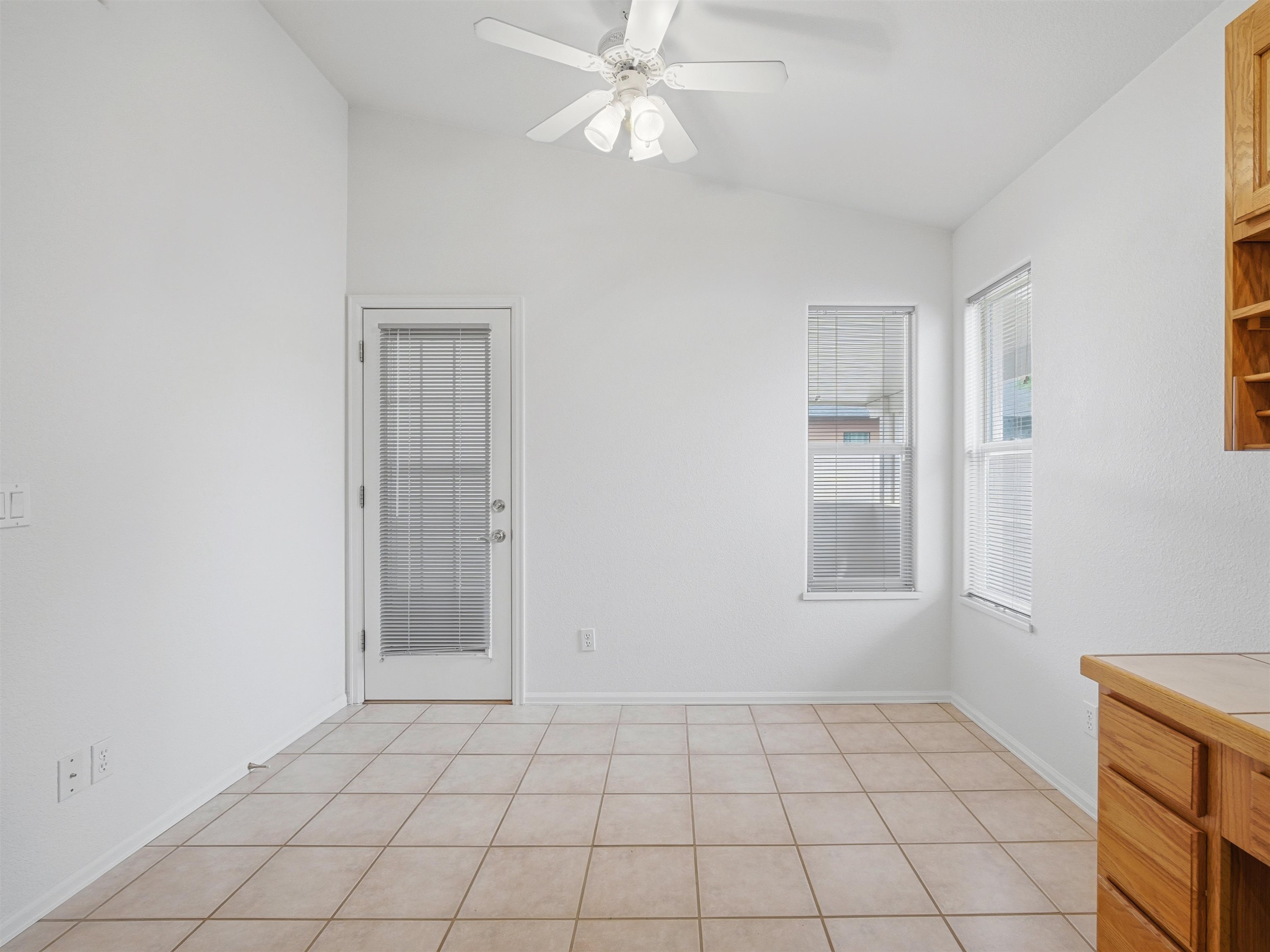 3082 Shadowbrook Court Grand Junction, CO 81504 - Photo 11 of 28 an empty room with windows and fan