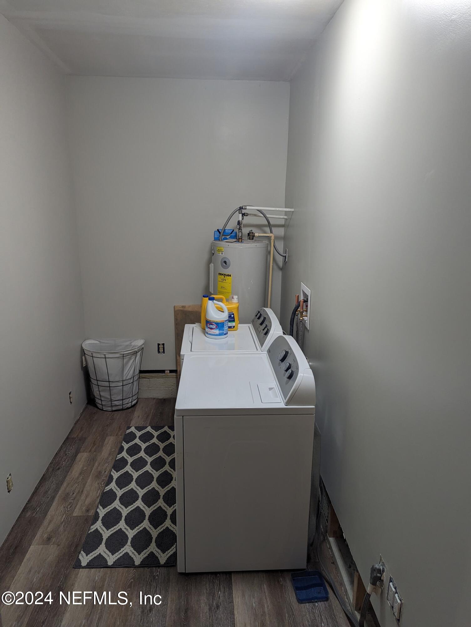 5120 Oakside Drive Jacksonville, FL 32244 - Photo 12 of 24 a storage room with washer and dryer