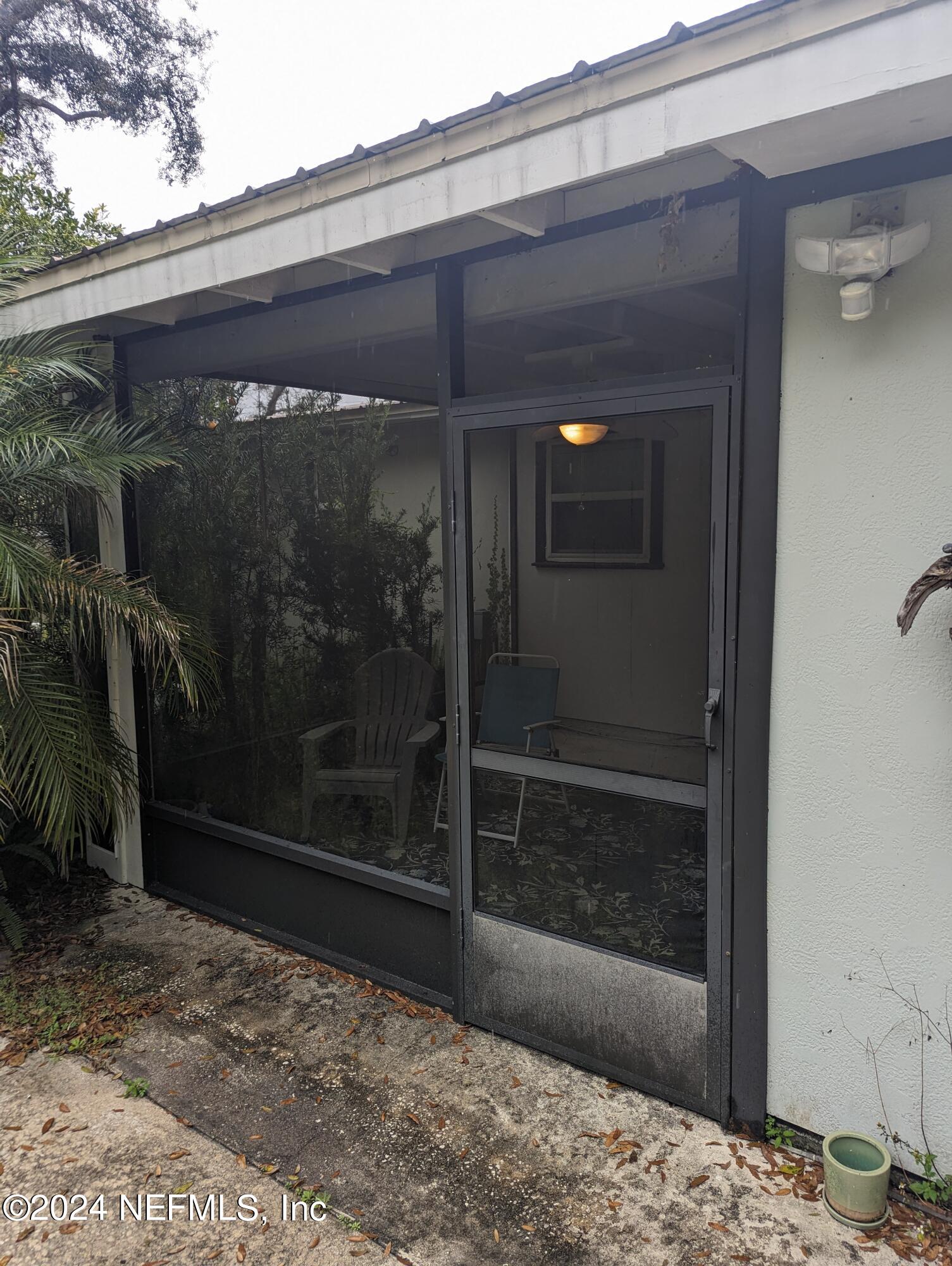 5120 Oakside Drive Jacksonville, FL 32244 - Photo 13 of 24 a view of a glass door of the house