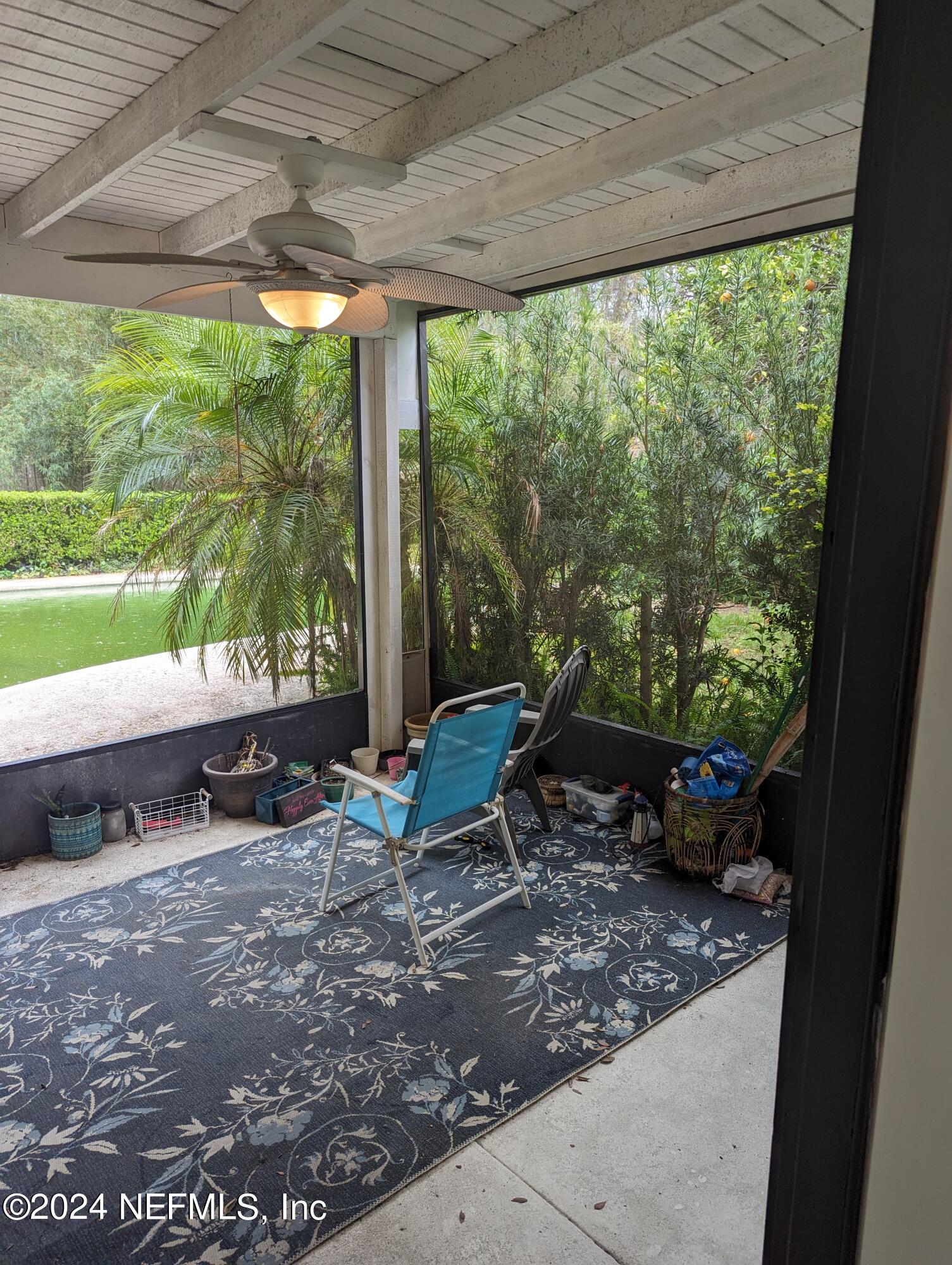 5120 Oakside Drive Jacksonville, FL 32244 - Photo 15 of 24 a living room with couch and trees