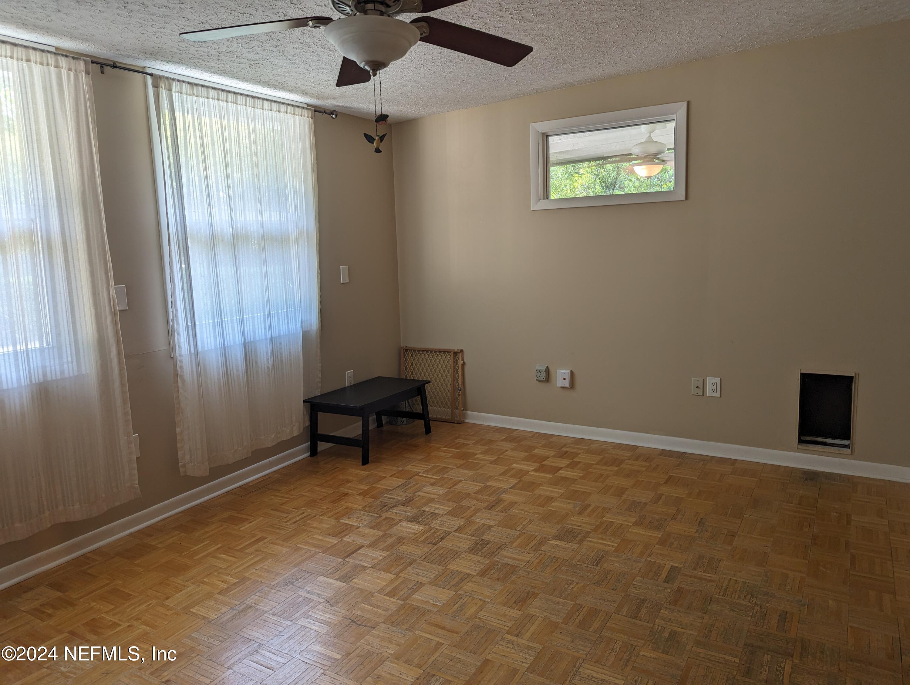 5120 Oakside Drive Jacksonville, FL 32244 - Photo 16 of 24 a view of an empty room with a window