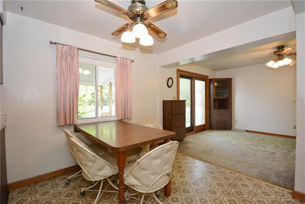 1034 Silver Lane McKees Rocks, PA 15136 - Photo 8 of 25 The dining area is outfitted with a ceiling fan and has a window overlooking the rear of the property.
