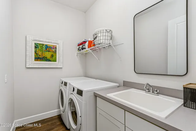 a view of a lake with a house swimming pool and outdoor space