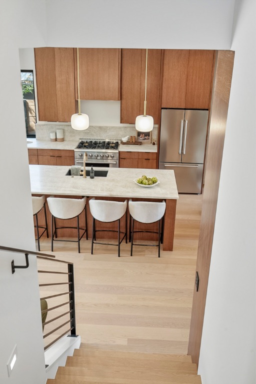 308 El Paso Street Austin, TX 78704 - Photo 11 of 38 a view of kitchen island with chair and table