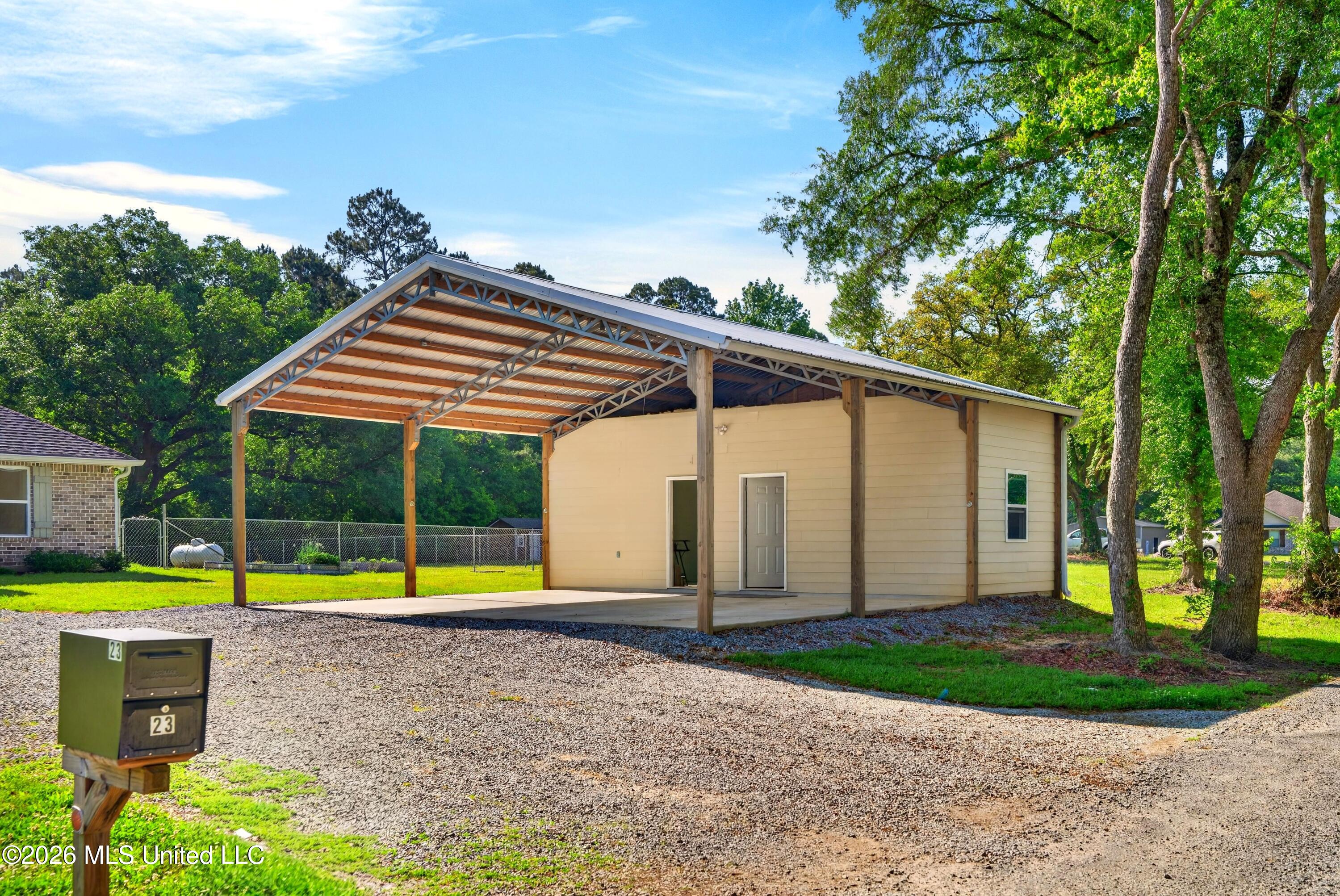23 Buddy Road Picayune, MS 39466 - Photo 4 of 49 3 Car Carport plus office and storage